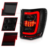 ANZO 1999-2004 Jeep Grand Cherokee LED Tail Lights w/ Light Bar Black Housing Smoke Lens