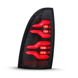 AlphaRex 05-15 Toyota Tacoma LUXX LED Taillights Alpha Blk w/Activ Light/Seq Signal